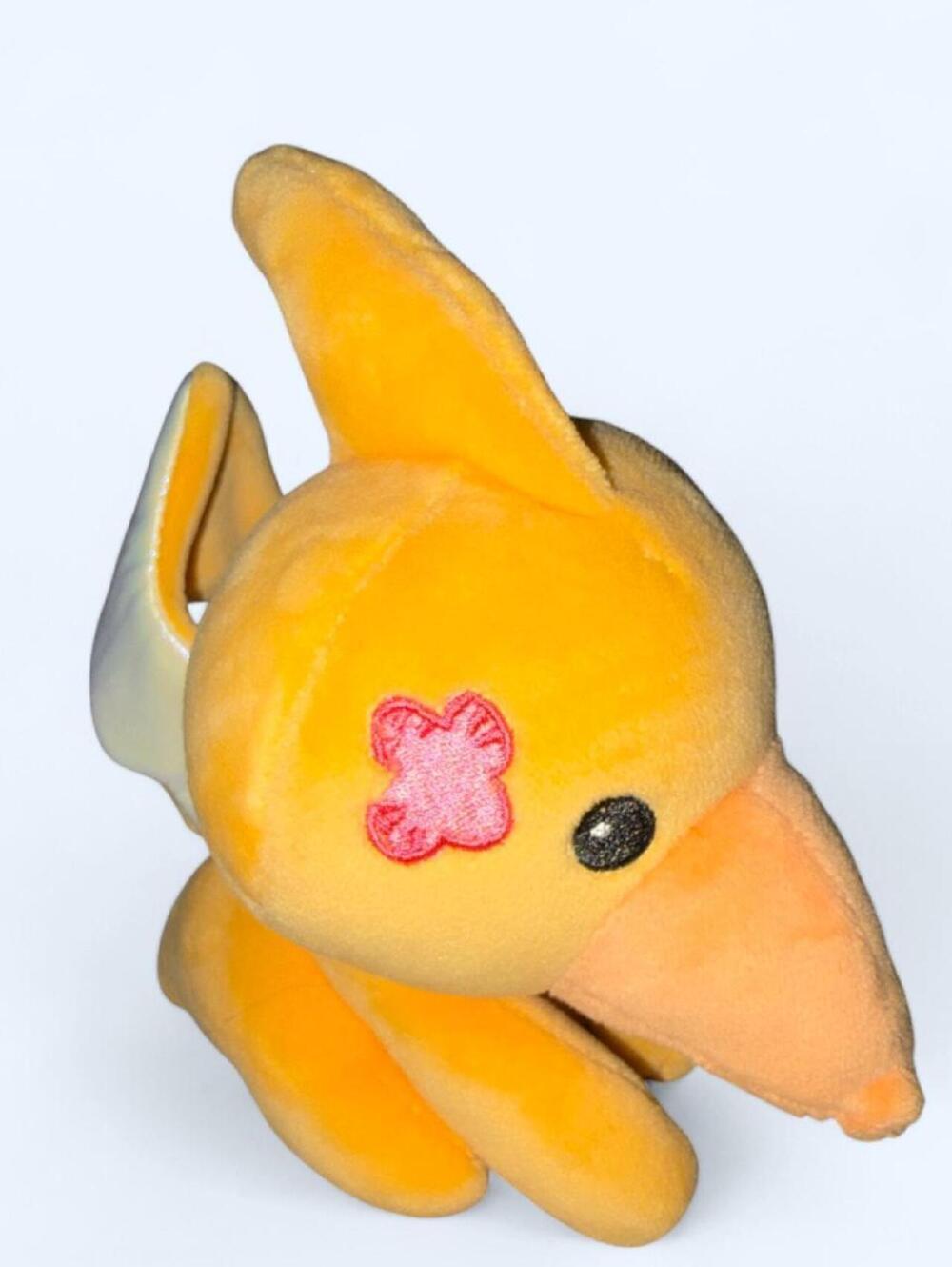 Yellow and Orange Plush Stuffed Animal with Pink Flower Patch - Pomkinz Style
